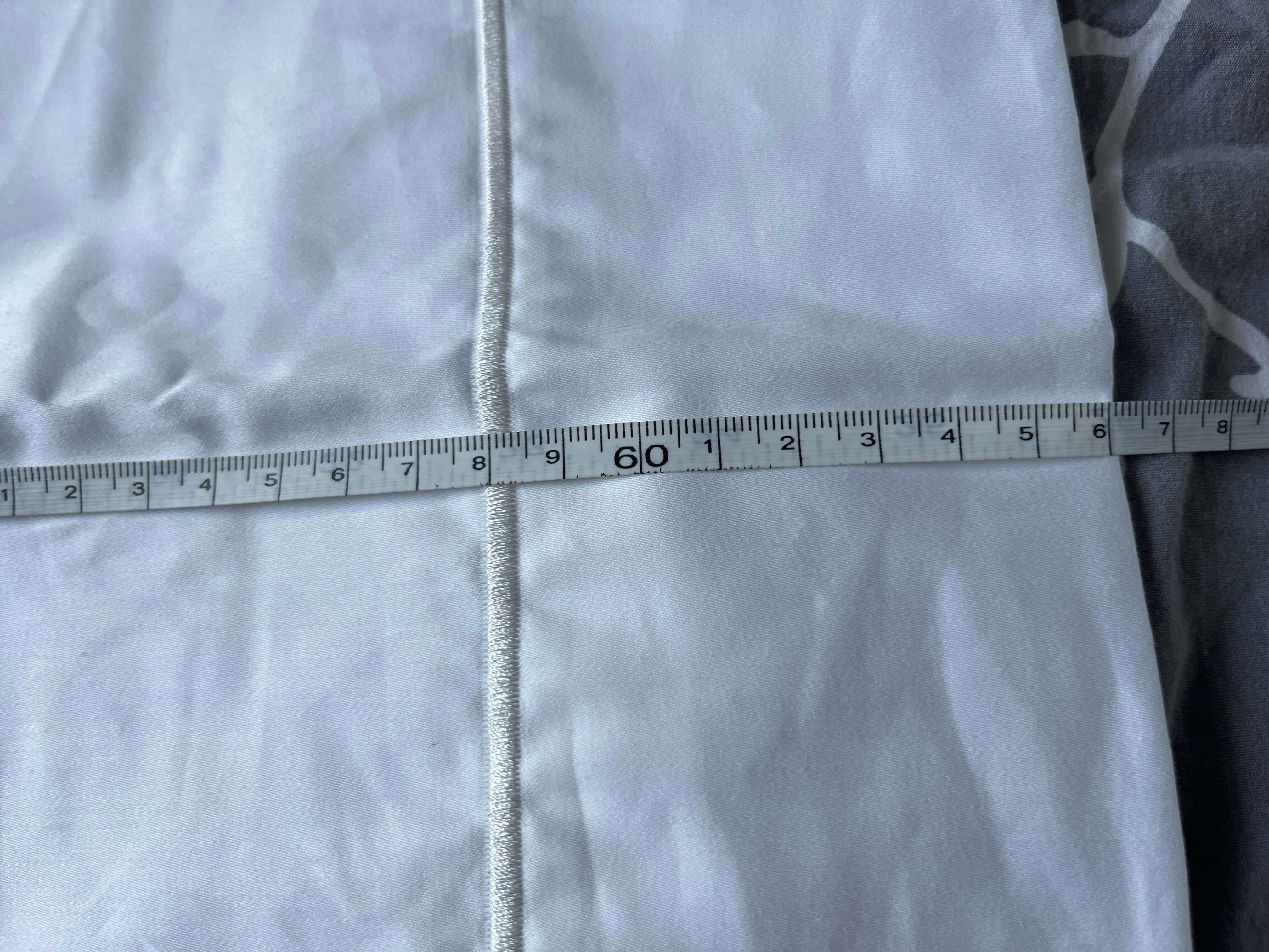 Medição de uma fronha com régua